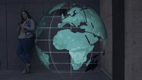 Woman leaning against building wall, using smartphone with technology globe hologram floating. Futuristic, digital, innovation, networking, urban, professional, sleek - Powered by Shutterstock - Get 15% off with code: PIKWIZARD15