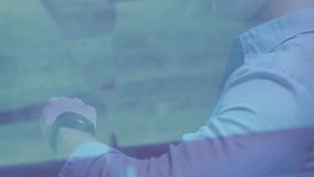 Man tapping smartwatch screen while digital interface displaying finance line charts arrows tickers. Technology, innovation, data visualization, wearable, futurism, finance, digital interface - Powered by Shutterstock - Get 15% off with code: PIKWIZARD15