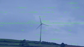 Wind turbine rotating atop rolling farmland, showing green data overlay pulsating across landscape. Sustainability, renewable, technology, rural, eco-friendly, digital, landscape - Powered by Shutterstock - Get 15% off with code: PIKWIZARD15