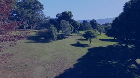 Red globe graphic being displayed over park scene, showing digital code columns and timeline. Futuristic, urban, technology, data, innovation, landscape, environmental - Powered by Shutterstock - Get 15% off with code: PIKWIZARD15