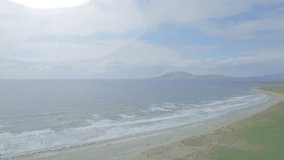 Blue bell notification icon floating over beach scene, surrounded by faded circular UI icons. Technology, interface, digital, communication, outdoors, relaxation, ocean - Powered by Shutterstock - Get 15% off with code: PIKWIZARD15