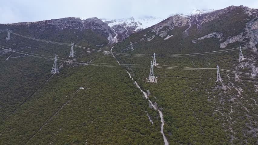 Nyingchi, Tibet, China - 7th April 2025 - Aerial view of transmission tower in China