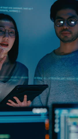 Vertical Screen : Group adult Asia male female software developers mentor leader manager talk strategy plan to executive write prompt AI bot app program nomad, data center. Projecting slideshow code.