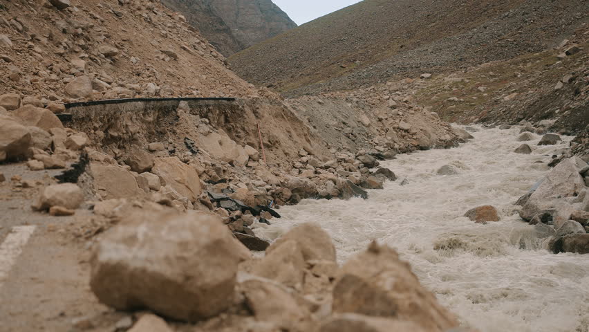 Collapsed Road Near Mountain River