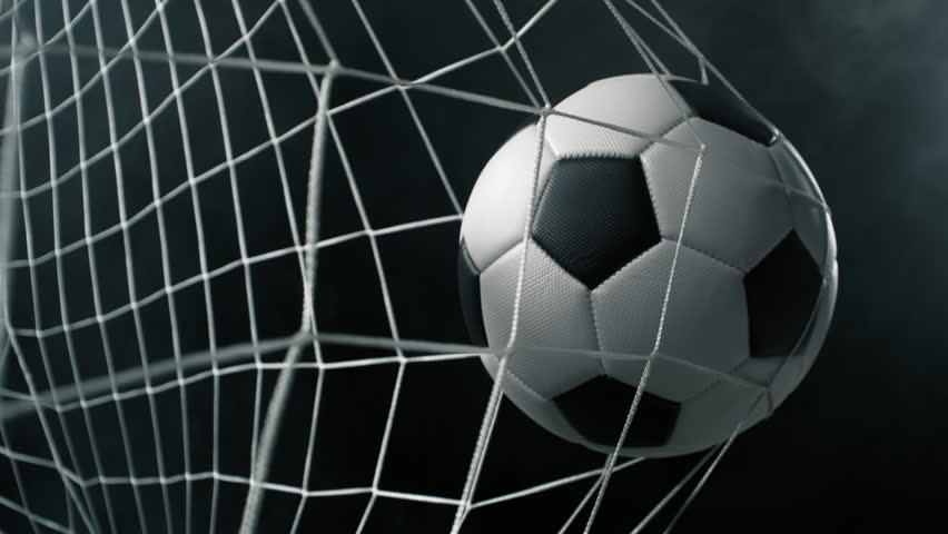 Super Slow Motion Soccer Ball Hitting Goal Net on Black Background, 1000fps.