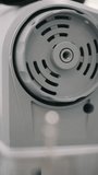 Close up of electric appliance ventilation grill - Powered by Shutterstock - Get 15% off with code: PIKWIZARD15