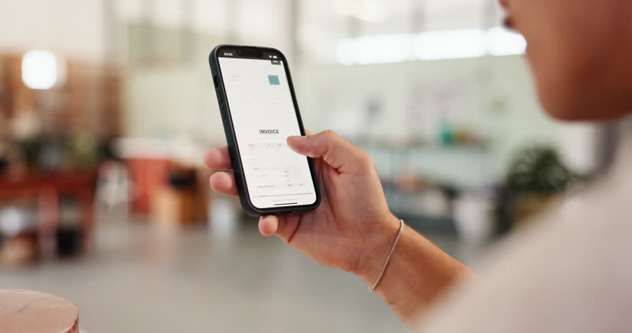 Man, phone screen and hands in startup for invoice, service quote and information in workshop. Creative, entrepreneur and statement on mobile display for stock order, account management and scroll