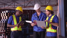 Team of diverse logistics workers walk through warehouse while inspecting pallet storage with strong teamwork and focus. - Powered by Shutterstock - Get 15% off with code: PIKWIZARD15
