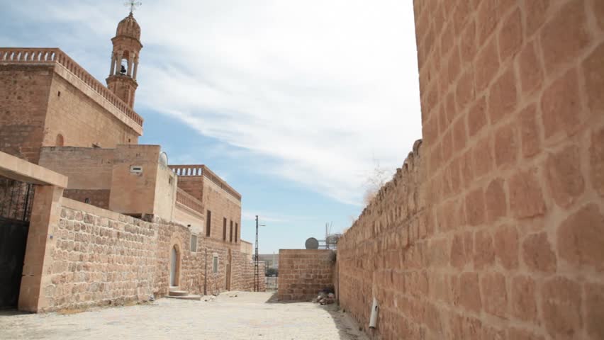 A little street between stone wall in Mardin