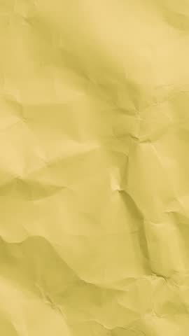 Yellow Crumpled paper texture crumpled sheet stop motion seamless loop