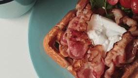 Delicious waffles served with fruit and syrup in a cozy breakfast scene. Perfect for food blogs, brunch promos, and lifestyle content focused on sweet mornings - Powered by Shutterstock - Get 15% off with code: PIKWIZARD15