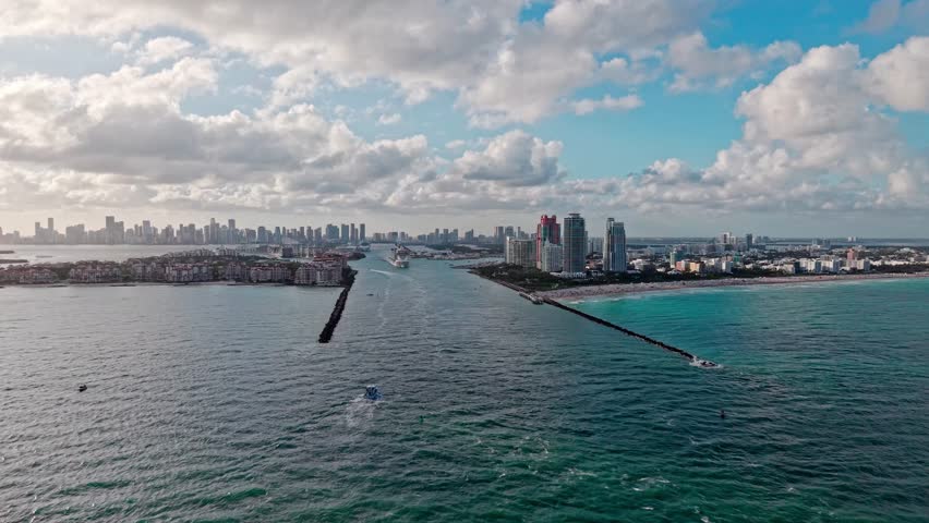 Cruise ship voyage. Aerial view of cruise in summer vacation. Cruise ship tour and travel at sea. Aerial view of luxury liner voyage. Ship leaving Miami beach port. Miami tour