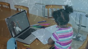 Student drawing on paper at table using laptop for education, network icons floating on screen. Creative workbook, digital learning, educational technology, childhood development, remote education, - Powered by Shutterstock - Get 15% off with code: PIKWIZARD15