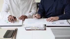 Two Business man team meeting present, investor colleagues discussing new plan financial graph data, analysis with laptop and digital tablet at work place - Powered by Shutterstock - Get 15% off with code: PIKWIZARD15