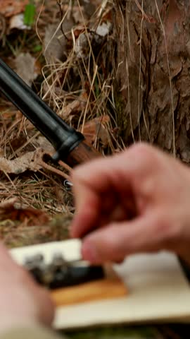 Russian Soviet Infantry Red Army Soldier In World War II using Russian Soviet Portable Radio Transceiver In Trench Entrenchment In Spring Autumn Forest. . Headphones And Telegraph Key. Close Up Hands,