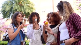 Diverse friends savoring ice cream cones, sharing laughter and joy during sunny park gathering, embodying carefree summer moments and genuine connection - Powered by Shutterstock - Get 15% off with code: PIKWIZARD15