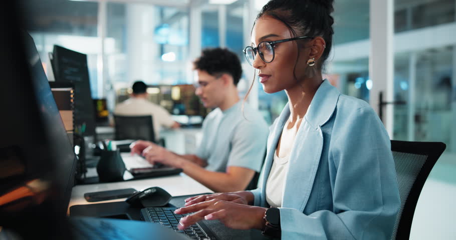 Arms crossed, face and smile of programmer woman at desk in office as graphic designer for software development. Coding, computer and web design with happy developer or engineer at night for update