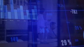 Presenter pointing at projected charts in business meeting, colleagues viewing numeric overlays. Corporate, teamwork, innovation, analytics, strategic, professional, collaboration - Powered by Shutterstock - Get 15% off with code: PIKWIZARD15