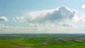 Aerial View of Rolling Green Fields and Cumulus Clouds - Powered by Shutterstock - Get 15% off with code: PIKWIZARD15