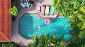 Aerial slow motion video of happy woman gracefully spinning in sparkling tropical pool next to flamingo float. Summer vacation background with sun loungers, striped umbrella, and palm trees in Florida - Powered by Shutterstock - Get 15% off with code: PIKWIZARD15