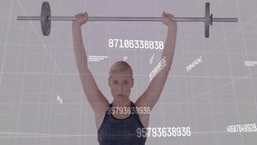 Woman lifting barbell overhead on grid backdrop overlaying floating numeric text for fitness tech. Strength, fitness, technology, data visualization, bodybuilding, digital, performance - Powered by Shutterstock - Get 15% off with code: PIKWIZARD15
