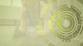 Woman holding plank position on rubber mat, displaying fitness data interface overlay. Athlete, wellness, motivation, digital interface, workout, concentration, modern - Powered by Shutterstock - Get 15% off with code: PIKWIZARD15