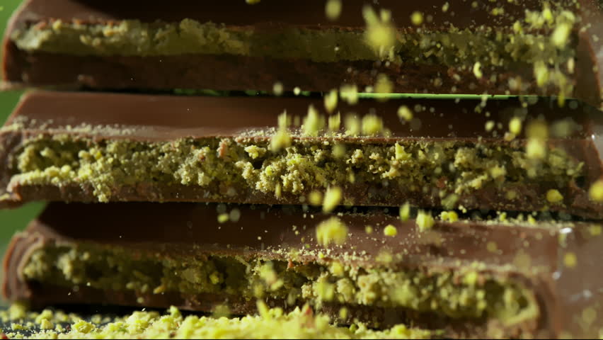 Super Slow Motion of Crushed Pistachios Falling on Dubai Chocolate Pieces at 1000fps.