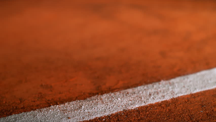 Tennis Ball Hits Line on Clay Court in Super Slow Motion, 1000fps.