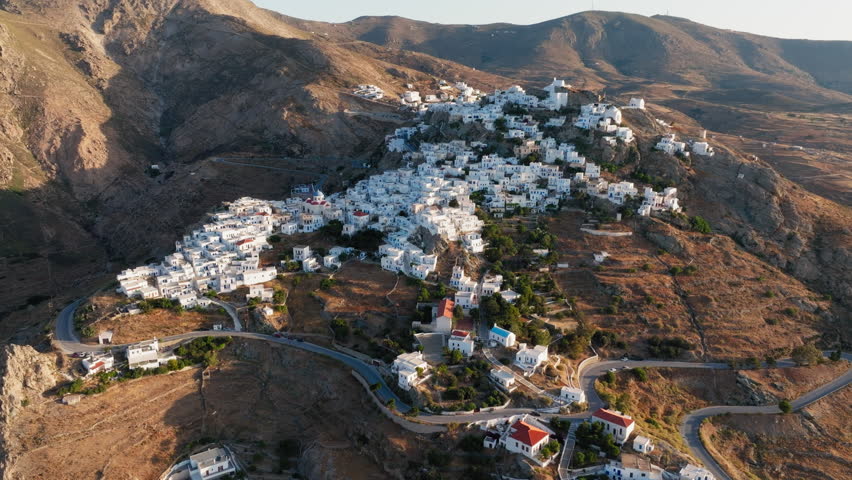 Morning sun hits Agios Konstantinos chapel overlooking Chora village, Serifos, Cyclades