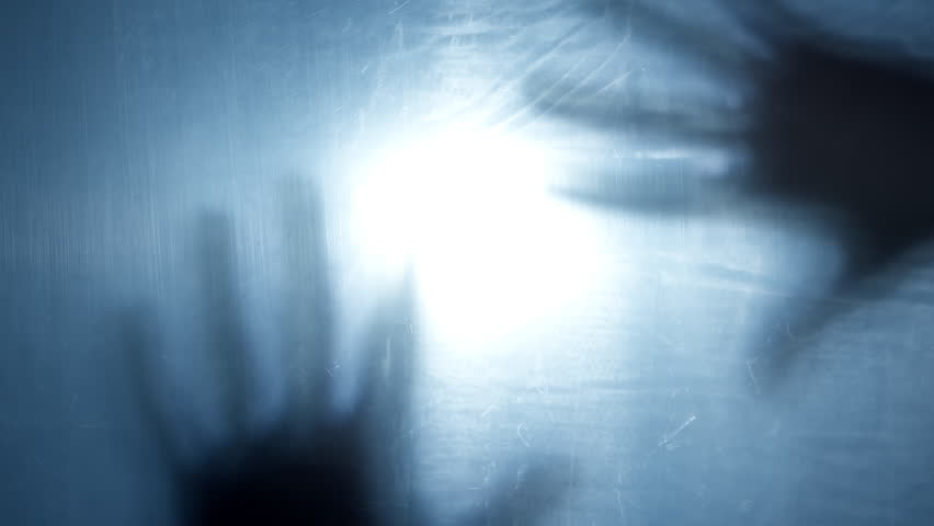 Silhouette of mystical hands. Zombie concept, horror, nightmares. Halloween. Mental health.