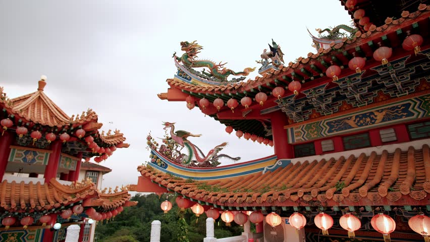 Red lanterns of a traditional chinese temple roof create a festive atmosphere, Thean hou temple, Kuala Lumpur, Malaysia
