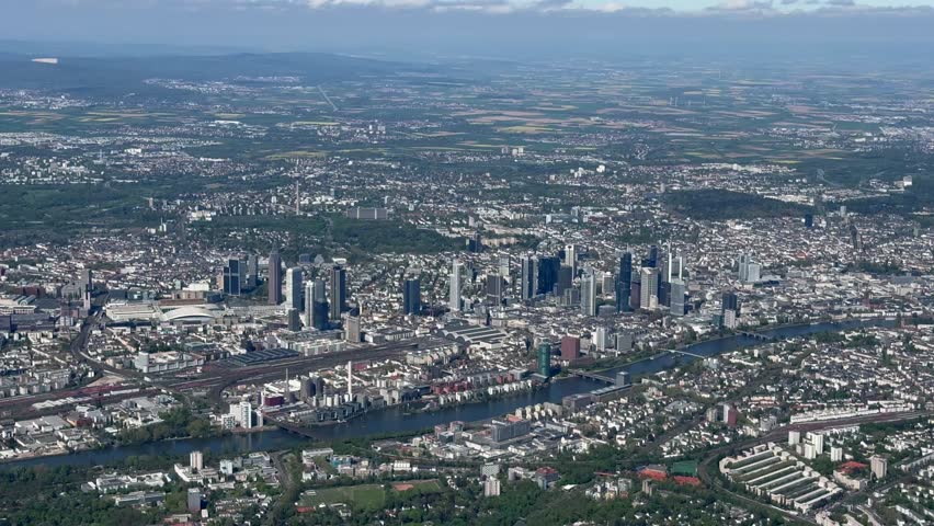 4k aerial video footage, flying along Frankfurt Main skyline with River Main and skyscrapers located in downtown. Frankfurt is the finance center of Germany and Headquarter of European Central Bank