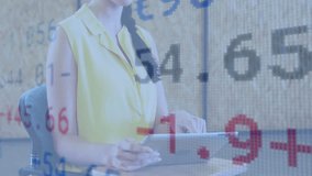 woman analyzing financial data at modern office desk, with floating blue and red numeric overlays. Technology, data, analytics, innovation, workspace, corporate, visualization - Powered by Shutterstock - Get 15% off with code: PIKWIZARD15