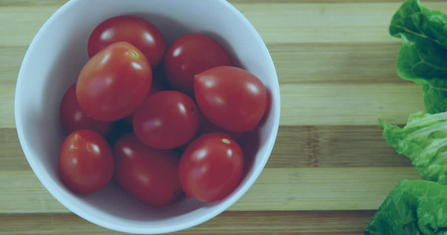Cherry tomatoes in bowl being rendered in flat design, showing grid overlay, line and bar charts. Produce, culinary, minimalist, infographic, food industry, healthy lifestyle, natural