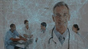 Medical team discussing data around glass table in meeting room, showing digital network overlay. Healthcare, teamwork, collaboration, professionalism, innovation, diagnosis, consultation - Powered by Shutterstock - Get 15% off with code: PIKWIZARD15