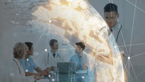 Medical team reviewing patient data on laptop around glass table, showcasing digital globe overlay. Healthcare, collaboration, technology, innovation, professionalism, analytics, digital - Powered by Shutterstock - Get 15% off with code: PIKWIZARD15