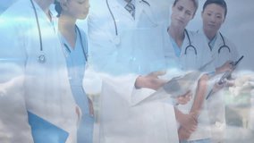 Medical team reviewing patient chart in hospital, with digital network icons connecting. Collaboration, healthcare, technology, professionalism, modern, innovation, teamwork - Powered by Shutterstock - Get 15% off with code: PIKWIZARD15