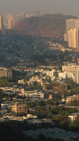 Barve Nagar, Ghatkopar West, Mumbai, Maharashtra, India. Mumbai Metropolitan Region. Aerial View From Airplane Window On View of the Mumbai suburb district. Evening morning sunset sunrise light