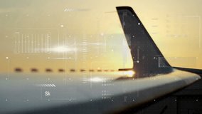 Aircraft wing, tail fin being displayed over sunset clouds with HUD bar charts, code snippet, grids. Aerospace, technology, innovation, futurism, digital interface, data visualization, aviation - Powered by Shutterstock - Get 15% off with code: PIKWIZARD15