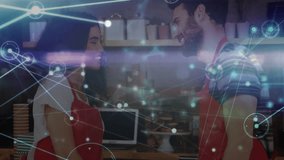 Two baristas managing coffee shop counter with tablet and pastries, showing tech network overlay. Cafe, hospitality, artisan, branding, modern, teamwork, connection - Powered by Shutterstock - Get 15% off with code: PIKWIZARD15