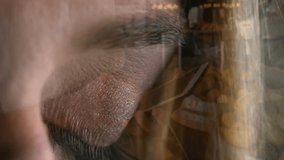 man focusing eye in technology workspace, displaying holographic code, grid lines and bokeh lights. Digital, innovation, cyber, futuristic, precision, analytics, technology - Powered by Shutterstock - Get 15% off with code: PIKWIZARD15