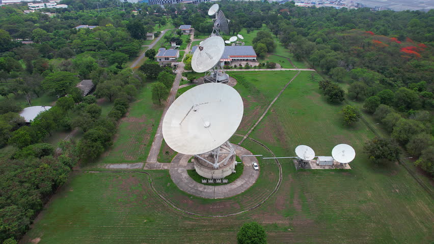 Modern satellite stations are used to receive and transmit various communications signals.