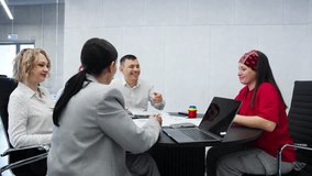 Millennial young female presenting startup project for investors, Team of Investors Listening to Startup Pitch - Powered by Shutterstock - Get 15% off with code: PIKWIZARD15