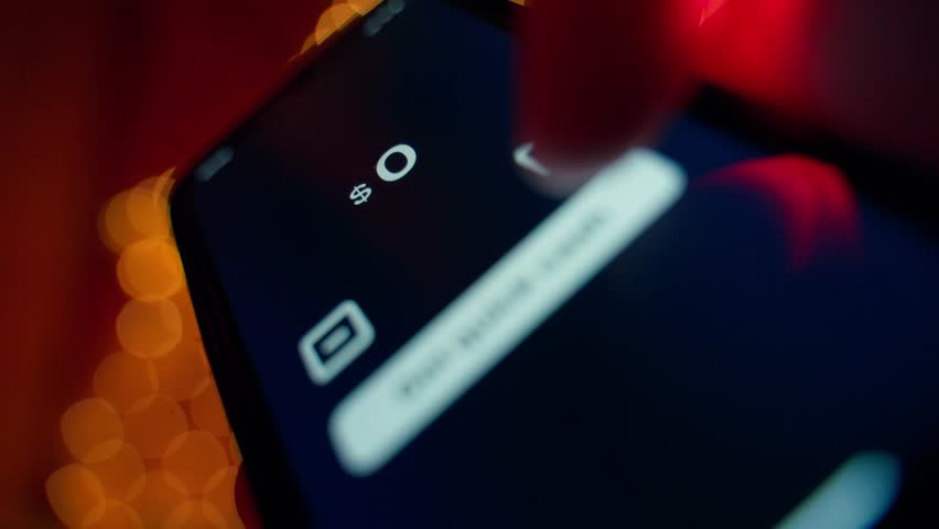 Receiving money through a mobile app. A fictional app for quick money loans, close-up