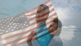 older couple carrying piggyback on sandy beach, with animated American flag overlay for travel ads. Senior, beach, companionship, adventure, vitality, outdoor, leisure - Powered by Shutterstock - Get 15% off with code: PIKWIZARD15