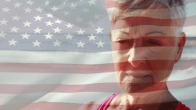 Senior woman smiling on ocean shoreline, featuring animated American flag overlay for marketing. Vibrant, inspirational, patriotic, wellness, outdoor, leisure, confidence - Powered by Shutterstock - Get 15% off with code: PIKWIZARD15