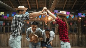 Joyous Partners Engaging in Festive Dance at Rustic Celebration. Smiling Couple Performing Traditional Steps at Brazilian Cultural Event - Powered by Shutterstock - Get 15% off with code: PIKWIZARD15