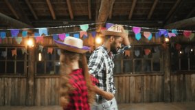 Radiant Woman with Vibrant Smile Participating in Festive Dance at Traditional Junina Event. Energetic Female in Country-Style Attire Dancing Towards Camera at Brazilian Celebration - Powered by Shutterstock - Get 15% off with code: PIKWIZARD15
