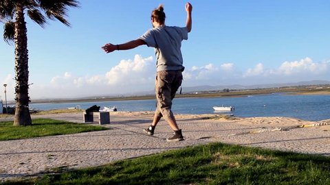 Man balancing and jumping, slackline