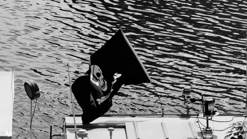 Pirate flag waving in the wind on a boat, black and white cinematic footage with skull and crossbones, Jolly Roger symbol on river water background, dramatic pirate theme. 4K Slow motion video 
